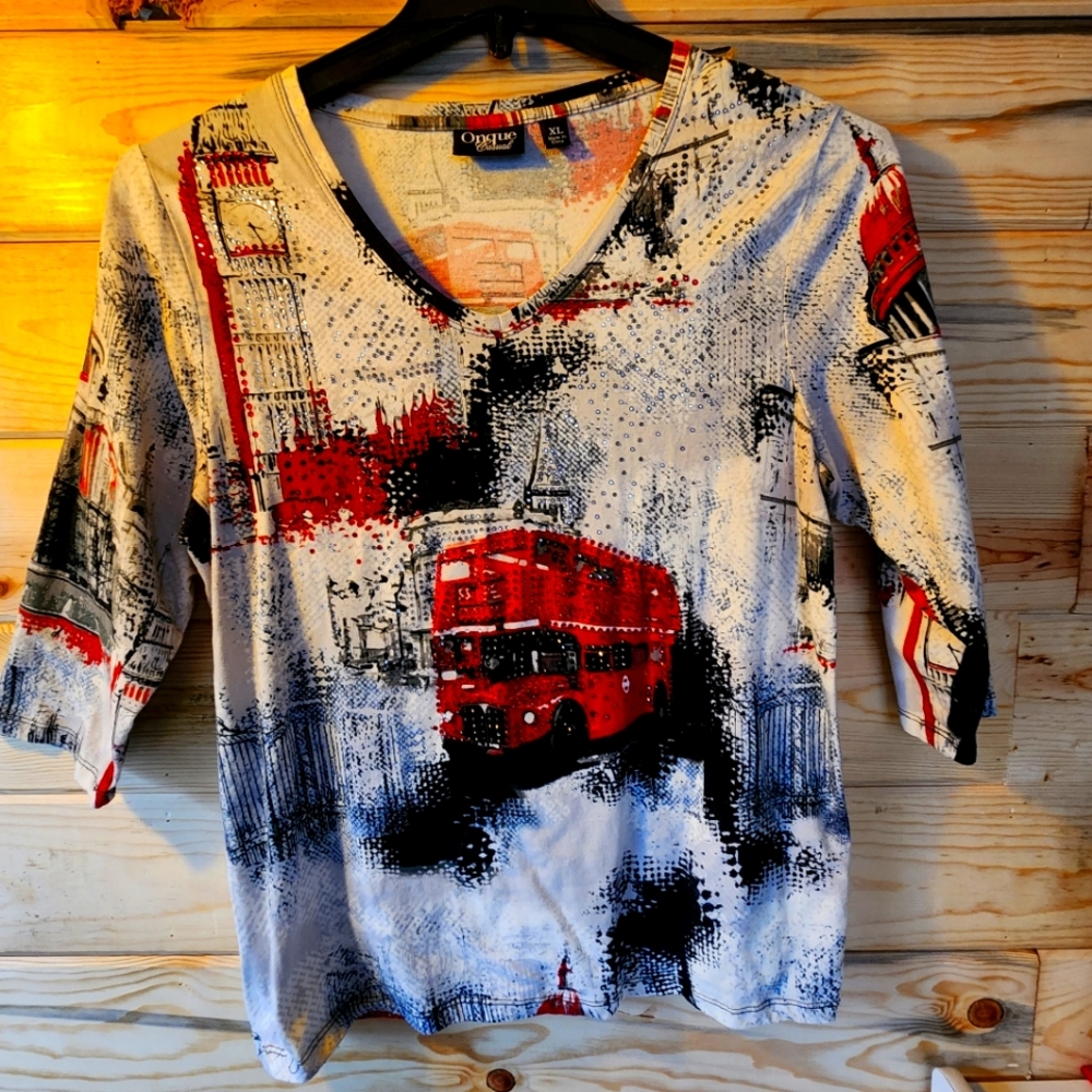 Pretty shirt by Onque Casual size XL See flaw.